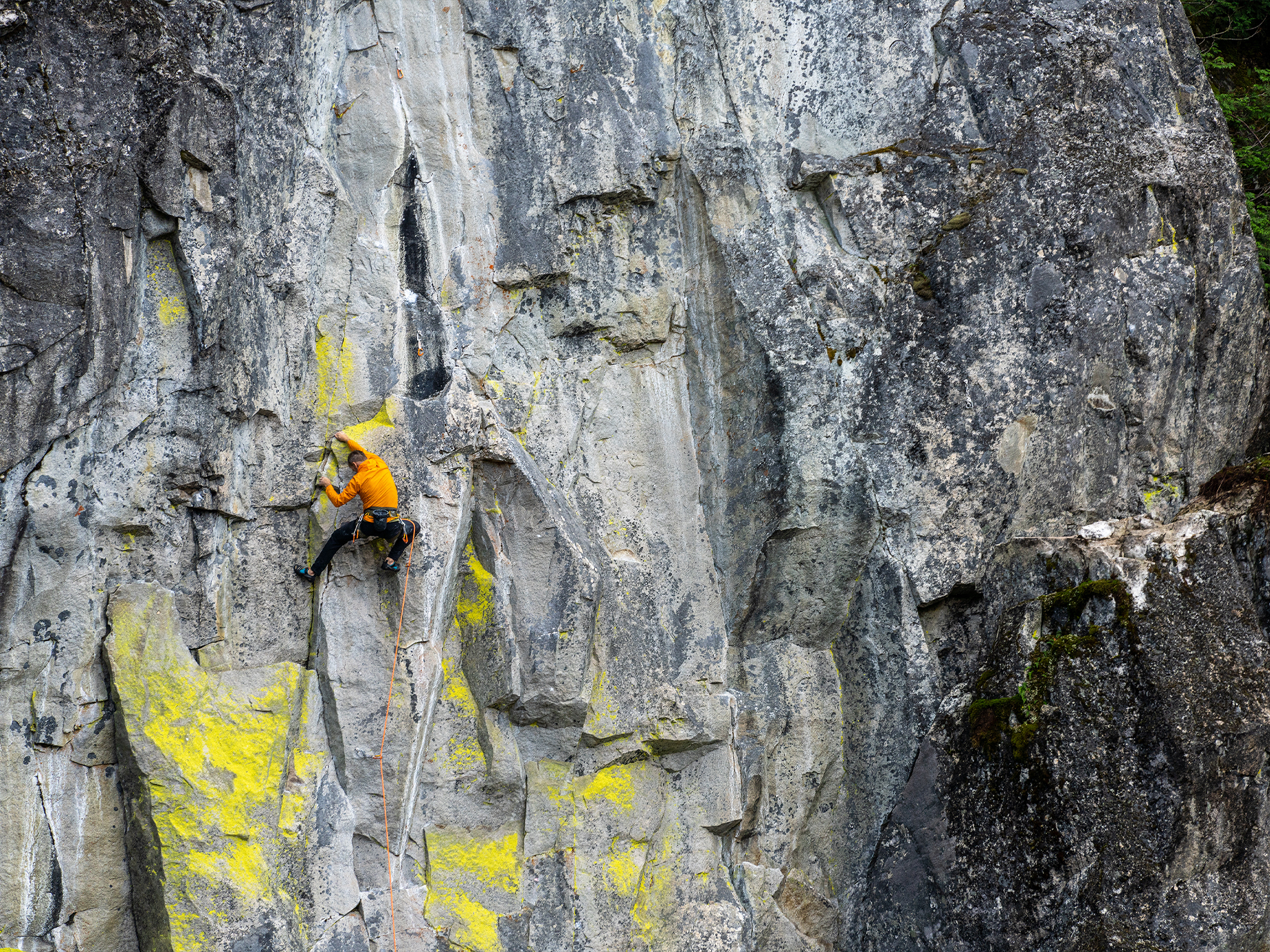 panel13_arcteryx-man-climbing-cliff